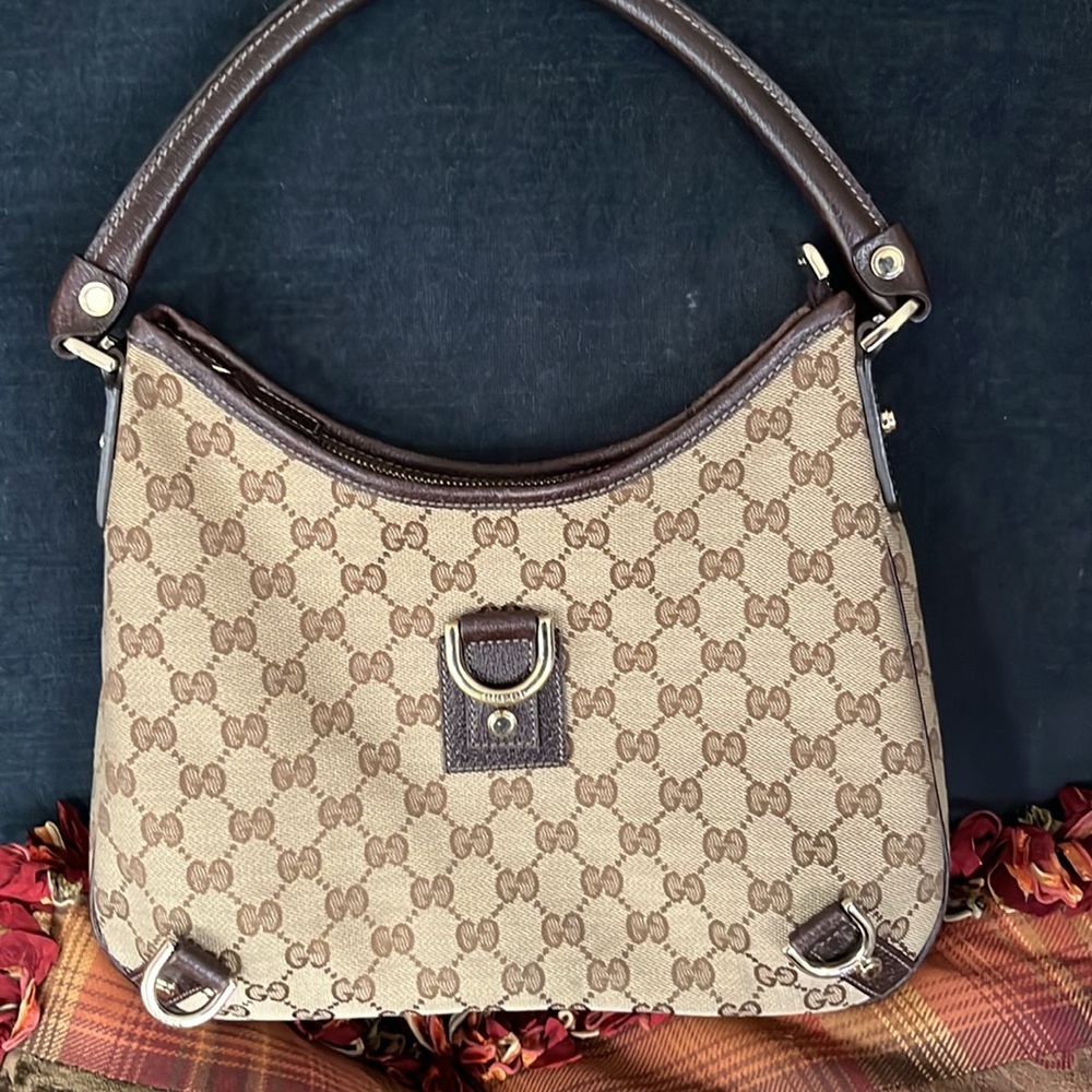 Gucci Brown Monogram
Like new! Used twice! Excellent condition/smoke free.